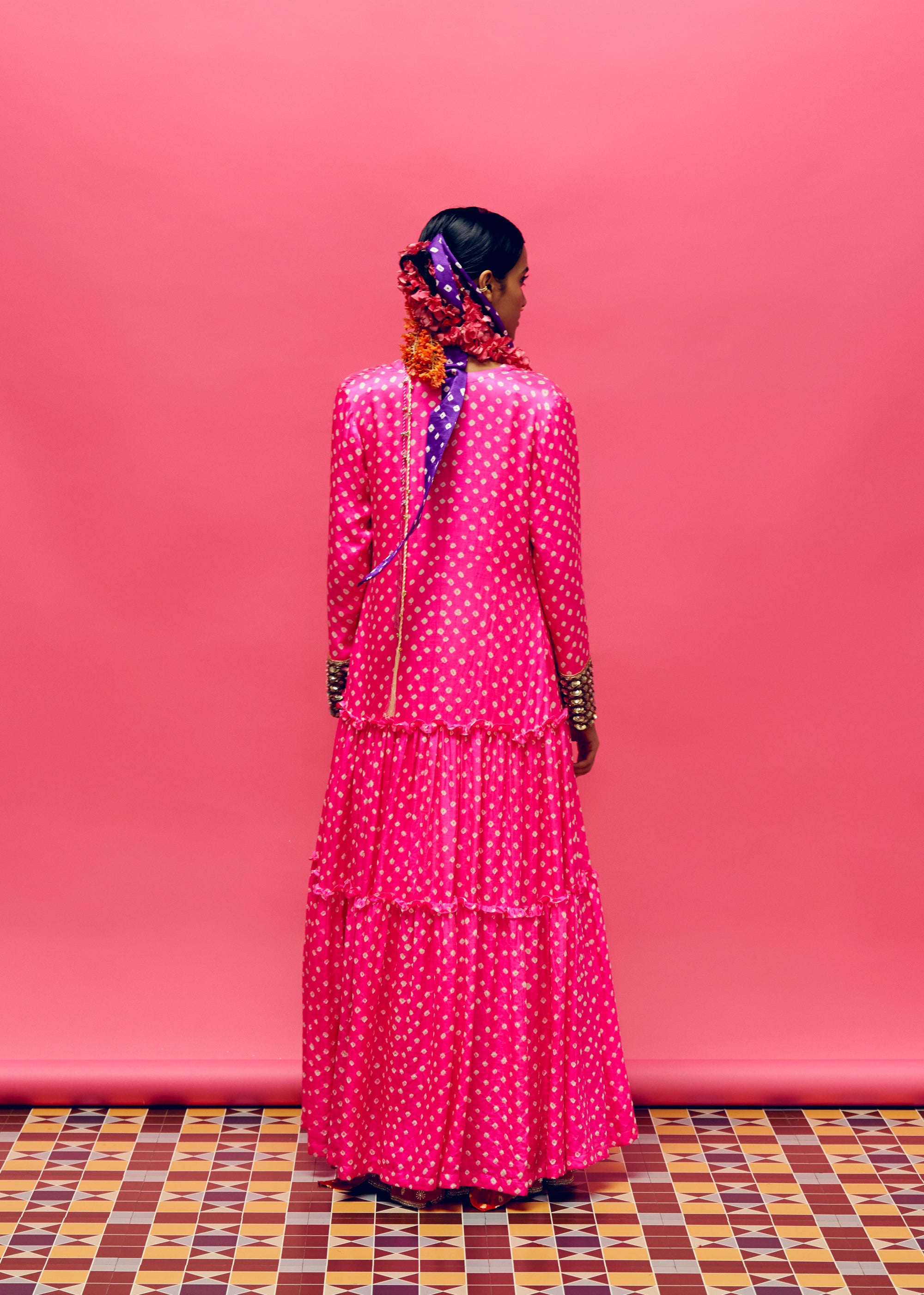 Gulabi Neon Pink Bandhani Tiered Jacket, dahlia Red Bandhani Hankerchief Kurta And ruby Red Pearl Flower Embroidered Gharara